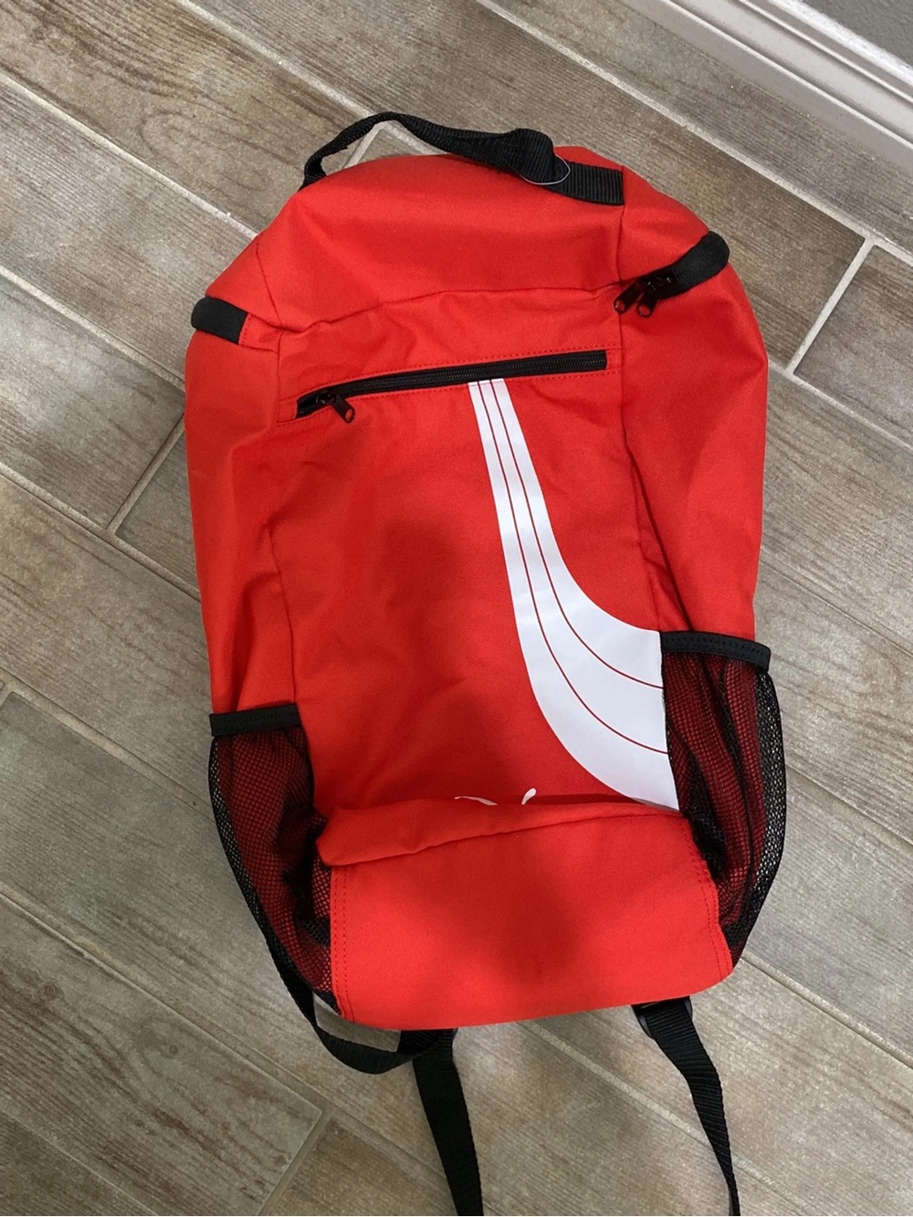 Puma Red Backpack with White Formstrip Swoosh Logo & Mesh Pockets